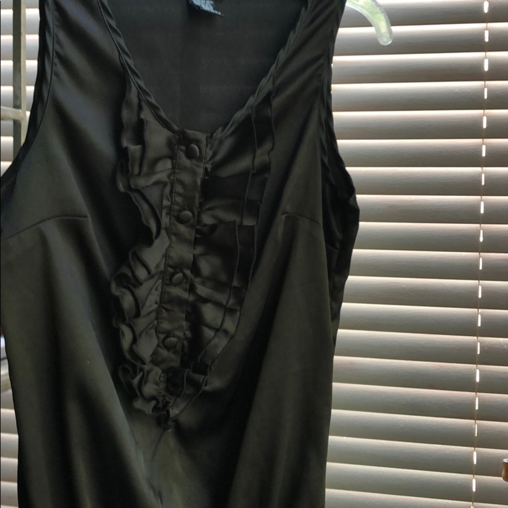 Black sleeveless cinched waist blouse